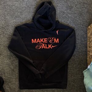 Nike Youth WNBA Black Hoodie with Vibrant Orange Text - Make ‘em Talk